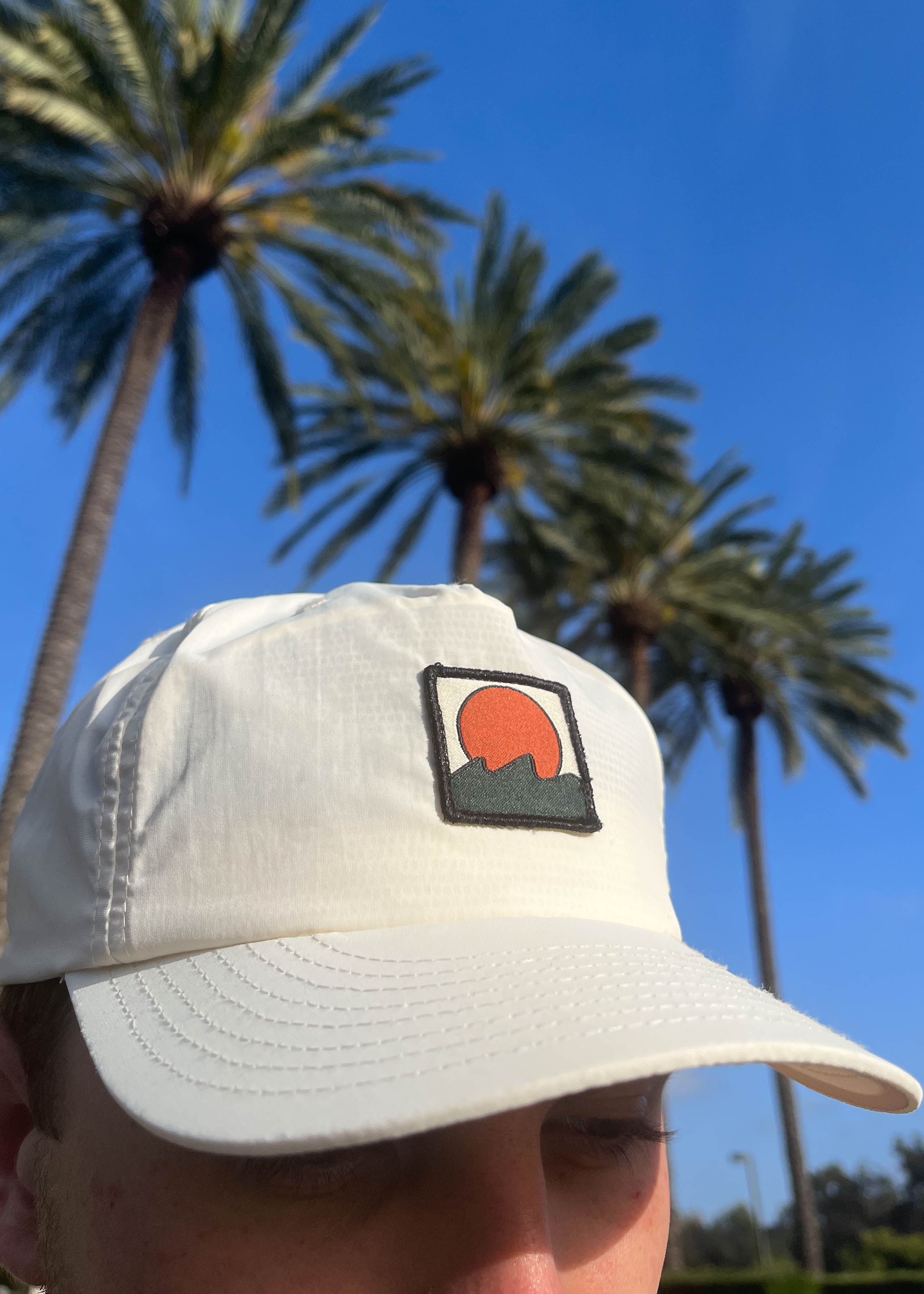 light weight cream colored snapback hat for golfing or for surfing