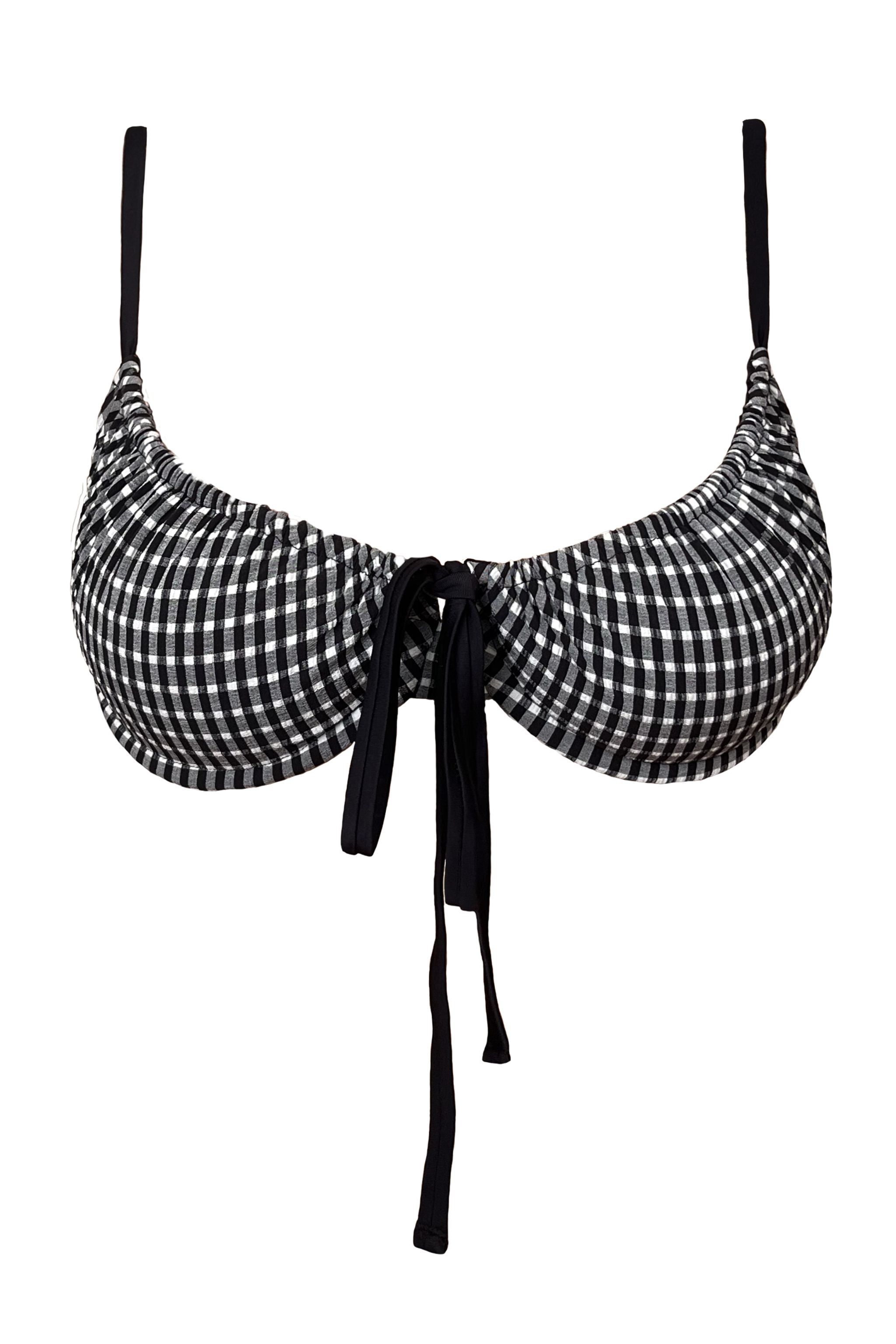 Black and white checkered bikini top with straps on a white background