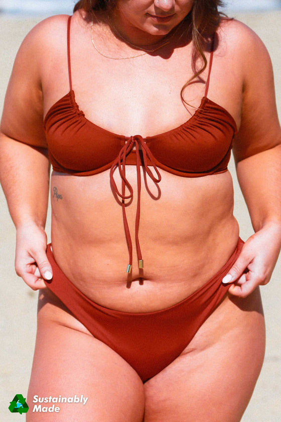 Rooted Swim Classic Bikini Bottom in Coconut. A mid rise, medium coverage bottom in a rust brown color
