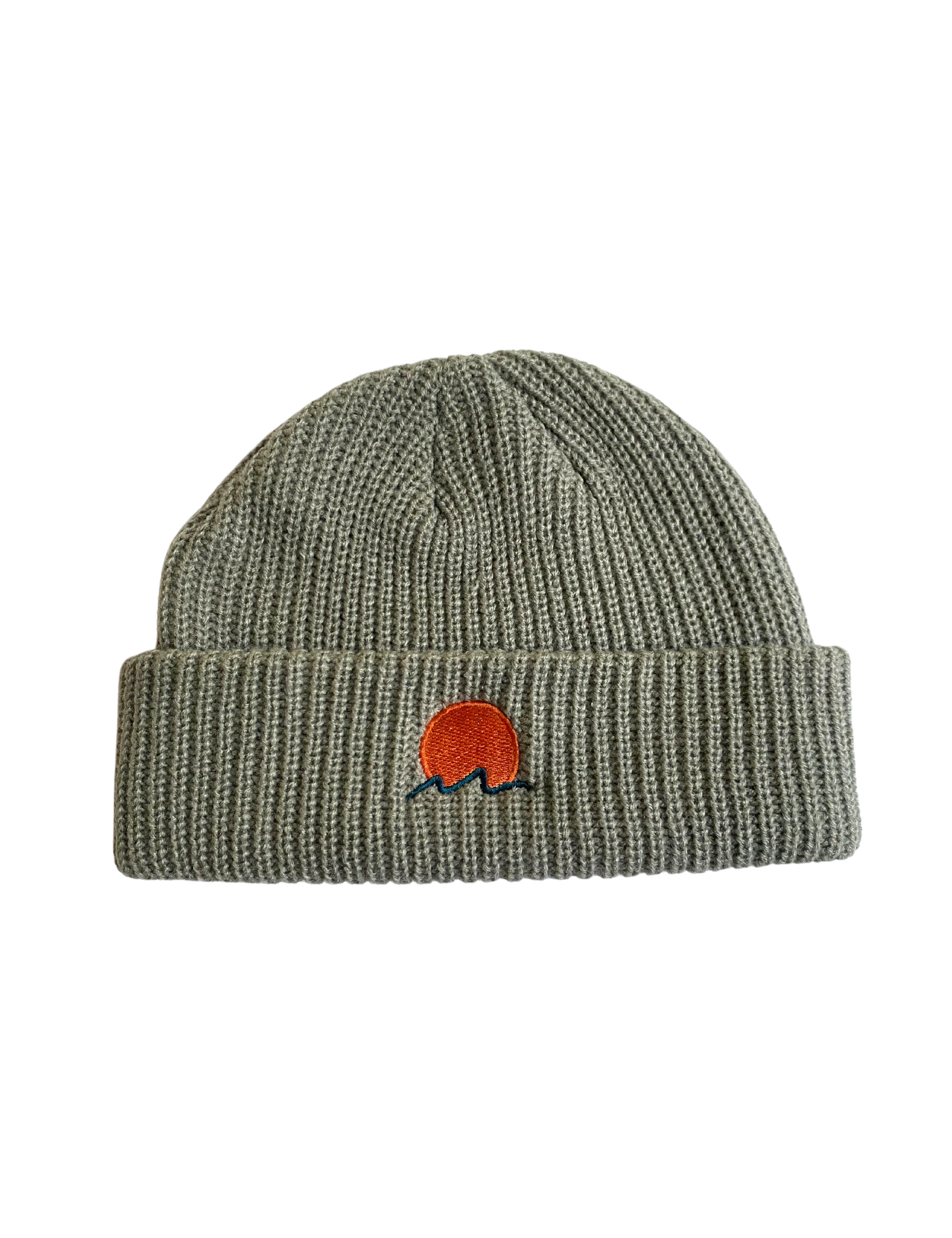 Classic cuffed knit fisherman beanie featuring embroidered Rooted Swim sunset logo in a soft green gray color. high quality knit beanie